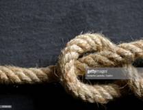 https://media.gettyimages.com/photos/closeup-of-rope-tied-up-picture-id767997433