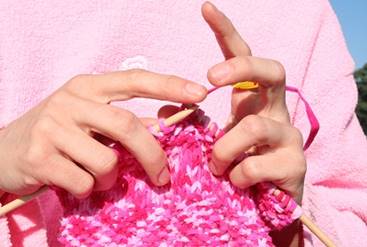 http://www.englishexercises.org/makeagame/my_documents/my_pictures/2012/oct/D2B_Pink_knitting_in_front_of_pink_sweatshirt.JPG