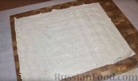 Фото приготовления рецепта: Рулетики из лаваша (три варианта: с колбасой, шпротами и крабовыми палочками) - шаг №9
