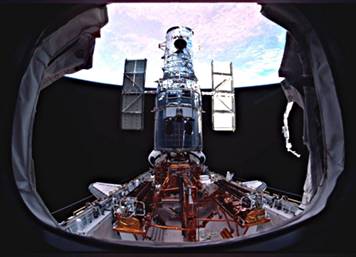 Պատկեր:Hubble on the payload bay just prior to being released by the STS-109 crew.jpg