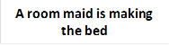 A room maid is making 
the bed

