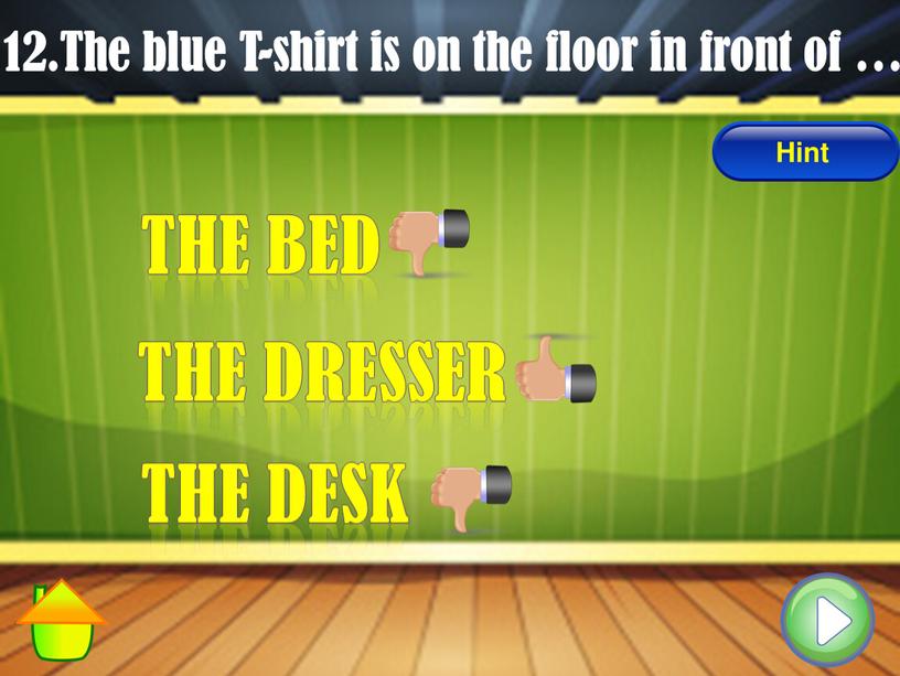 The blue T-shirt is on the floor in front of …